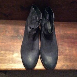 Blue leather ankle boots.